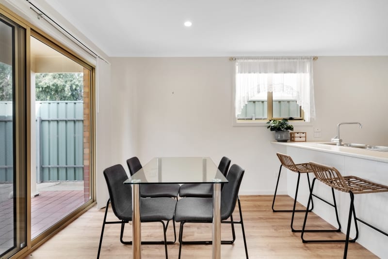 Aberfoyle-park-retirement-living-dining-with-breakfast-bar-from-kitchen