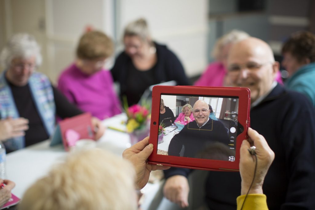 older people enjoying a party at aged care facility in adelaide