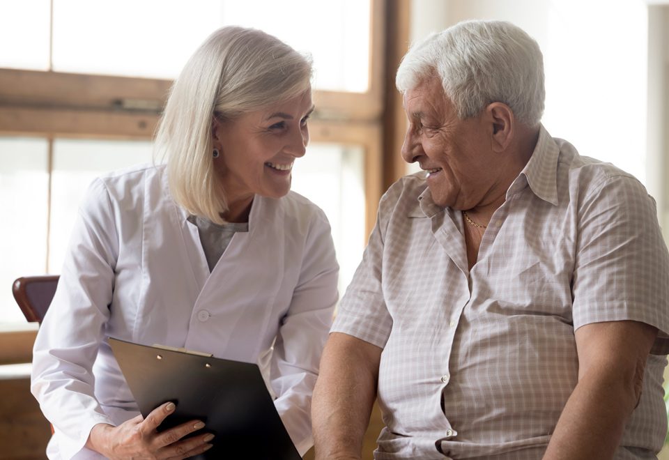 Older man speaking to GP about hay fever