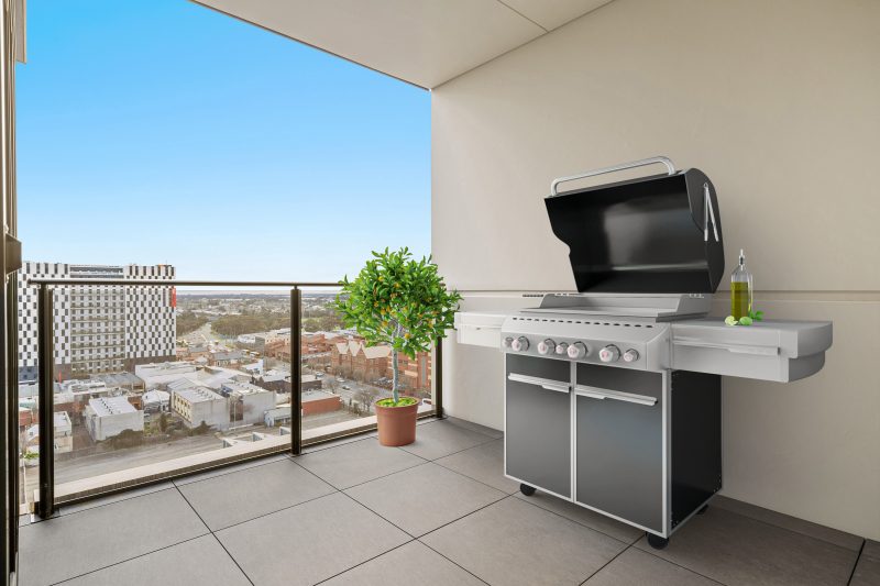 city retirement living bedroom with view and BBQ