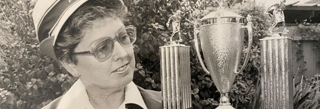June Goodhand shows her trophies won in lawn bowls.