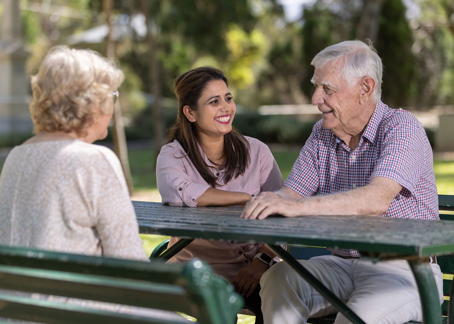 Multiskilled Care Worker at Healthia, talking to residents