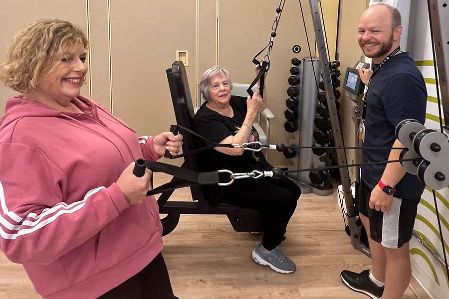 Marie and Sharon exercising at Health Studio 50+ Glenelg, with Scott, Fitness Leader Health Wellness