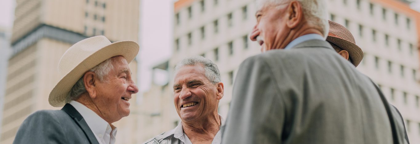 Group of older gentlemen catching up in Adelaide