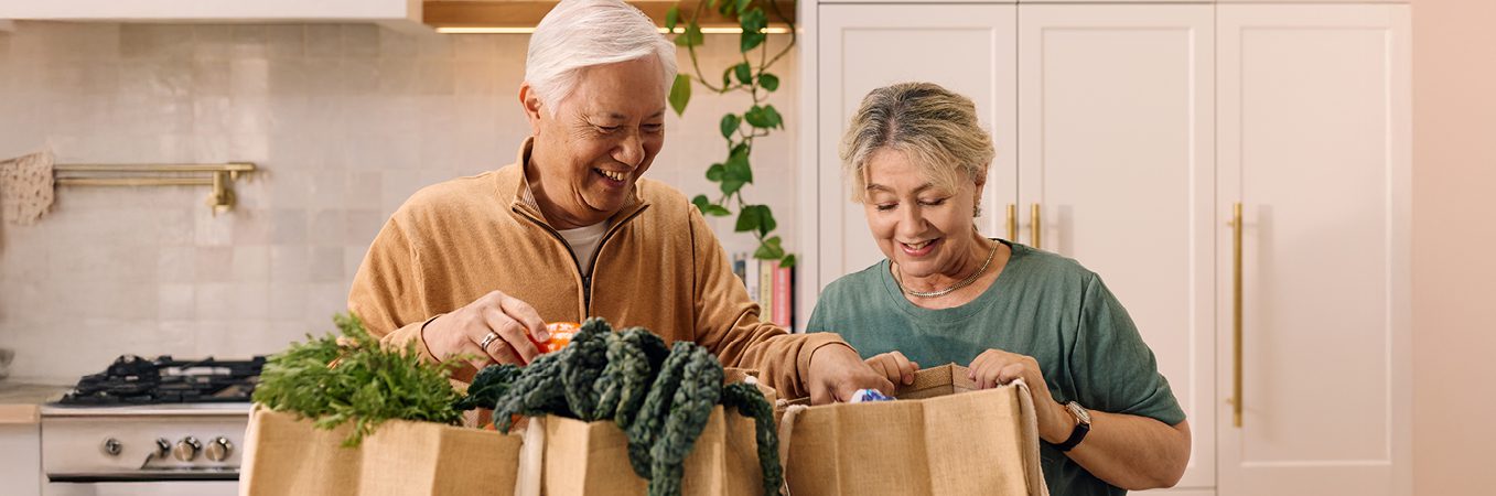Home Care Package Guide with ACH Group - support worker helping a customer with shopping