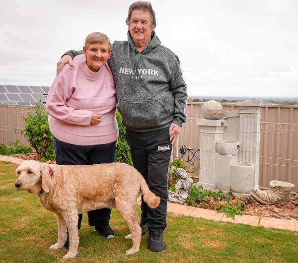 Pam and Ian with their dog, reflecting on their journey with Home Care Packages