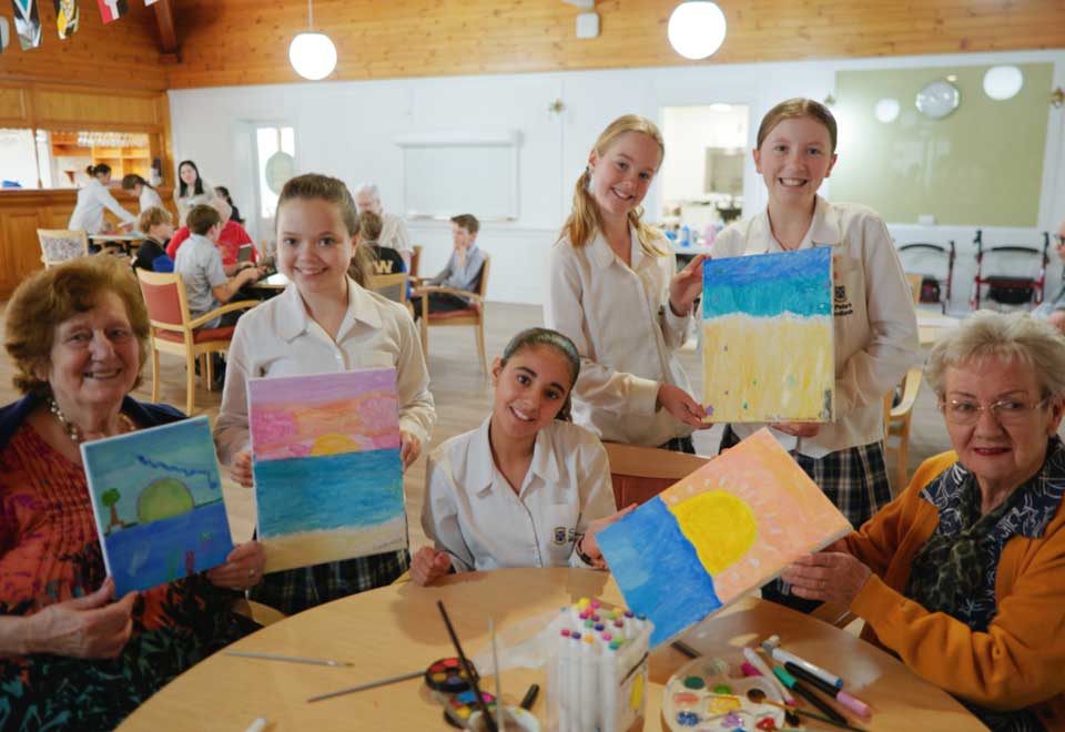 Students from St Peter's Woodlands and residents from Kapara