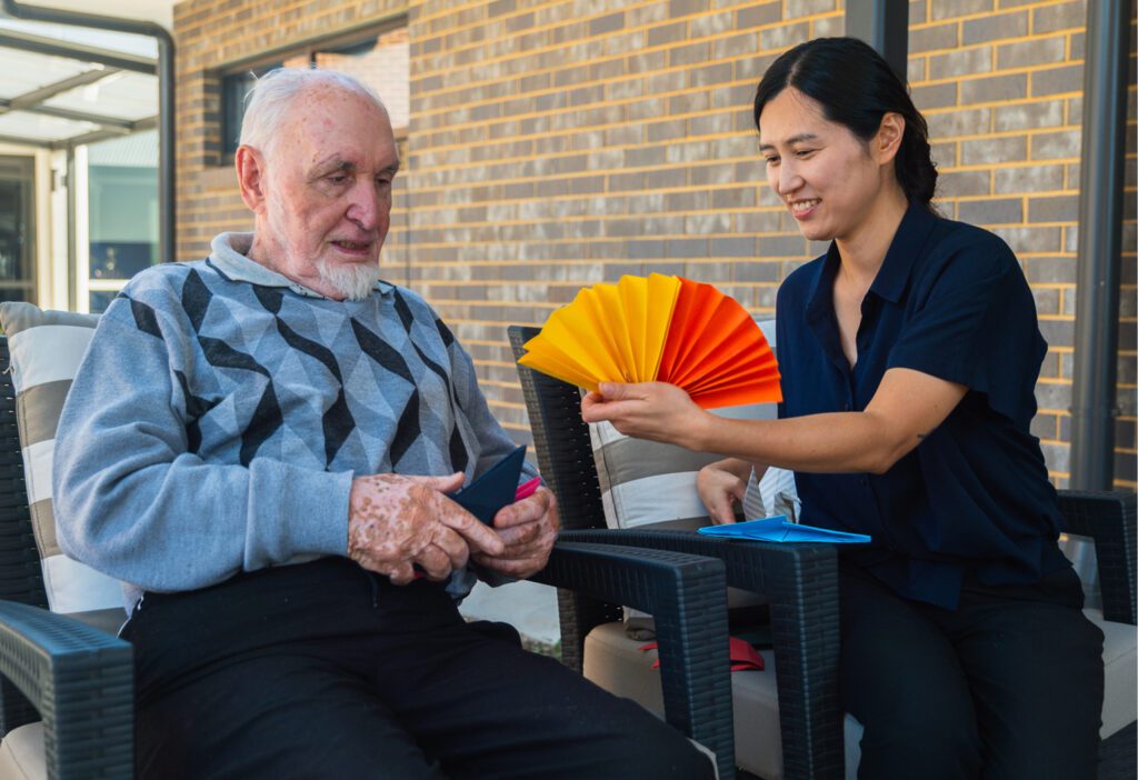 Volunteer with resident at Healthia