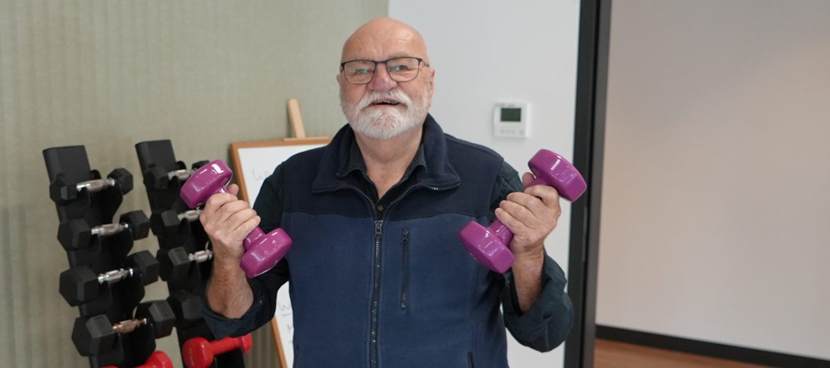 Brian Harris is a resident leader, and Health Studio Customer - here pictured with weights at Health Studio Rostrevor