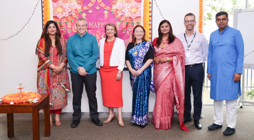 Diwali at ACH Group - a group of staff members celebrating the festival of light