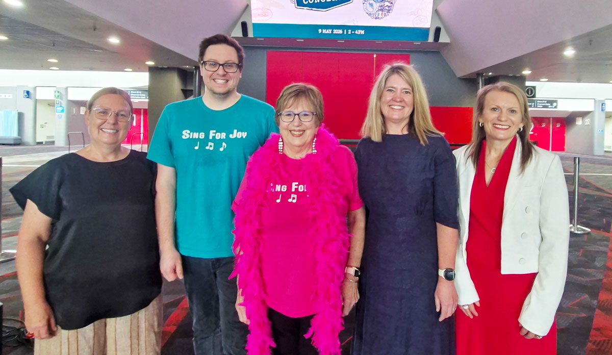 ACH Group team, including CEO Linda Feldt, Choir Director Paul Sinkinson at the launch of Sing for Joy Concert