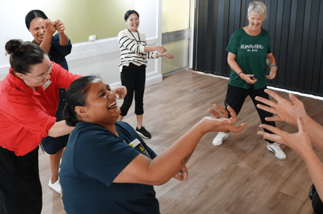 A moment of laughter can shift everything. Laughter therapy supports connection, calm and wellbeing.