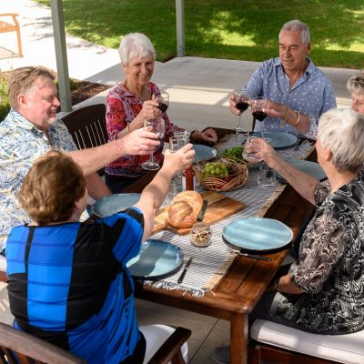 Elkanah Lifestyle Photos (6) Group of retirees dining outside